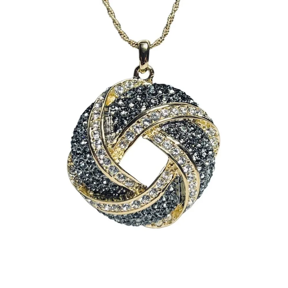 Nolan Miller Gold Tone Rope Chain Necklace With Love Knot Crystal Pendant (6006) - Picture 2 of 6